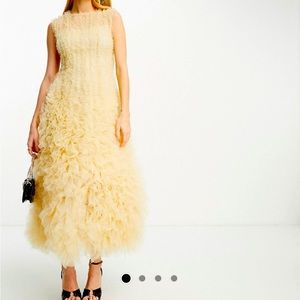 Wedding dress! Totally new and fantastic. I decided to not get married (drama!)